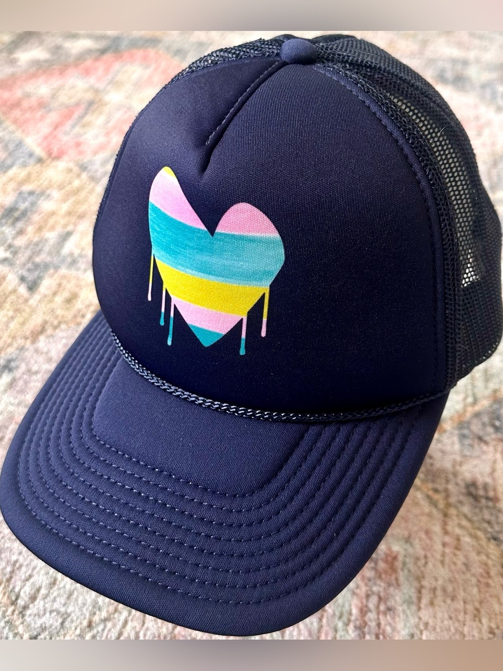 Kerri Rosenthal Navy Trucker Hat with Pastel Drip Heart Graphic